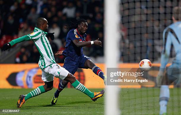 Bafetimbi Gomis of Lyon shoots off target during the UEFA Europa League Group I match between Olympique Lyonnais and Real Betis Balompie at Stade de...