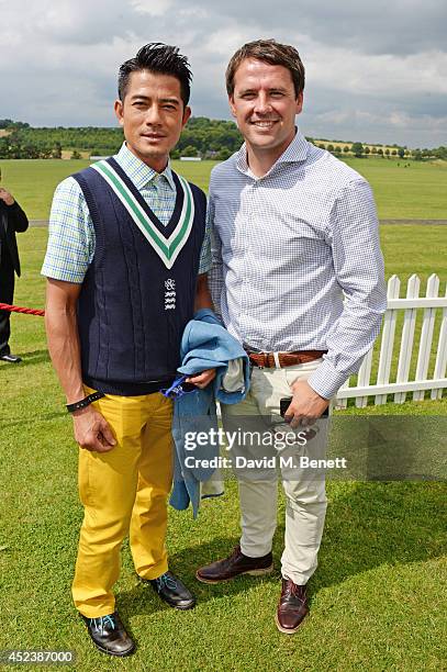 Aaron Kwok and Michael Owen attend the Kent and Curwen Royal Charity Polo Cup at Watership Down, Sydmonton Court Estate on July 19, 2014 in Newbury,...