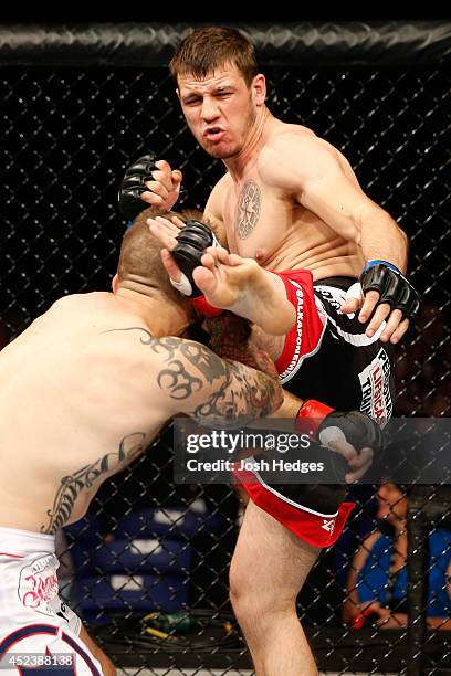 Nikita Krylov kicks Cody Donovan in their light heavyweight bout during the UFC Fight Night event at The O2 Dublin on July 19, 2014 in Dublin,...