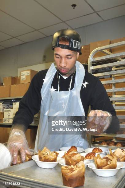 Rapper Tyga serves dinner at Union Rescue Mission on November 28, 2013 in Los Angeles, California.