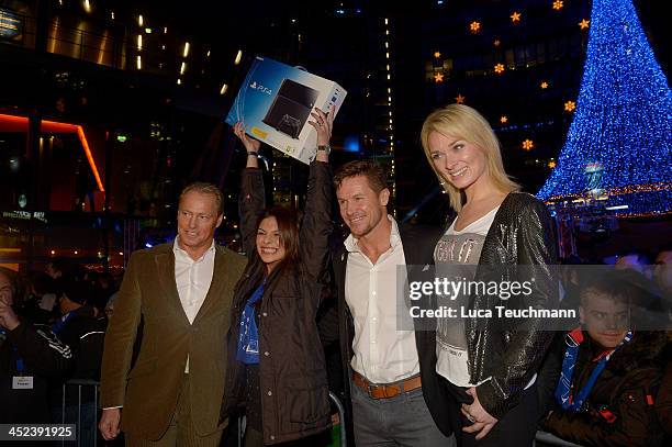 Uwe Bassendowski head of Sony Computer Entertainment Deutschland; Beriwan Wenzke ; Felix Baumgartner and Julia Fischer attends Sony Launches...