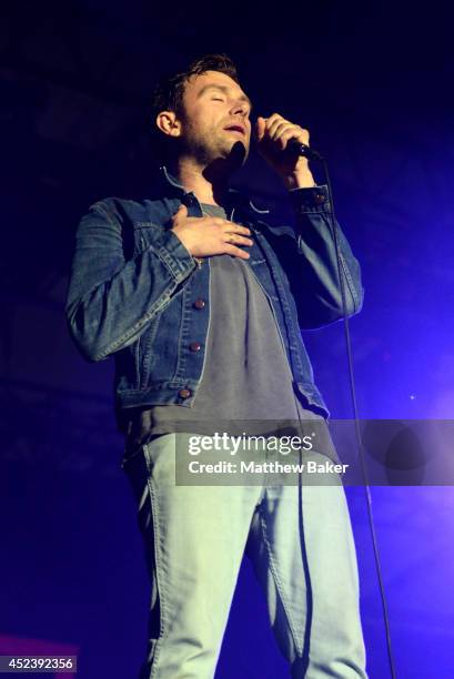Damon Albarn performs on the Obelisk Arena stage at the Latitude Festival at Henham Park Estate on July 19, 2014 in Southwold, England.