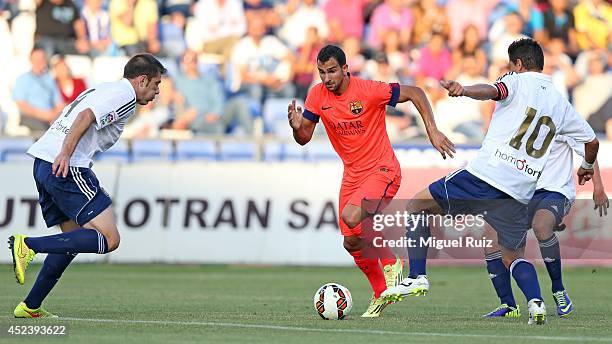 Martin Montoya of FC Barcelona manages the ball during the Trophy Colombino match between Recreativo de Huelva and FC Barcelona at Estadio Nuevo...