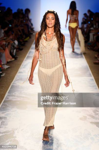 Model walks the runway at the L*Space By Monica Wise fashion show during Mercedes-Benz Fashion Week Swim 2015 at Cabana Grande at The Raleigh on July...