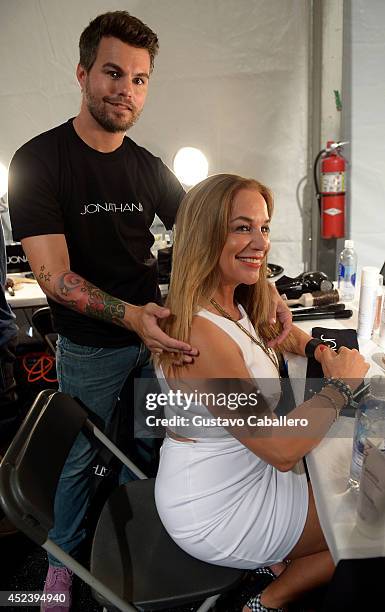 Jonathan Powell and Designer Monica Wise pose backstage at L*SPACE By Monica Wise with Jonathan Product during Mercedes-Benz Fashion Week Swim 2015...