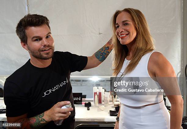 Jonathan Powell and Designer Monica Wise pose backstage at L*SPACE By Monica Wise with Jonathan Product during Mercedes-Benz Fashion Week Swim 2015...