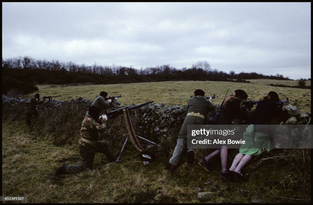 Ira With Rifles IRA gunmen and women with a Browning .50 calibre heavy machine gun ...