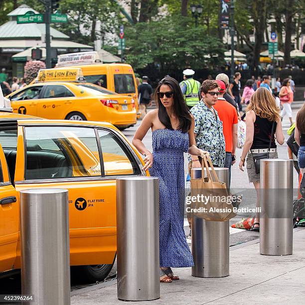 Olivia Munn is seen filming HBO's "The Newsroom" at Bryant Park on July 19, 2014 in New York City.