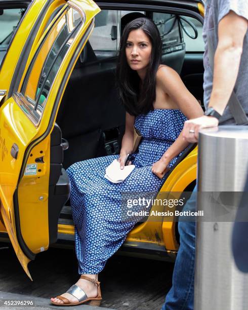 Olivia Munn is seen filming HBO's "The Newsroom" at Bryant Park on July 19, 2014 in New York City.