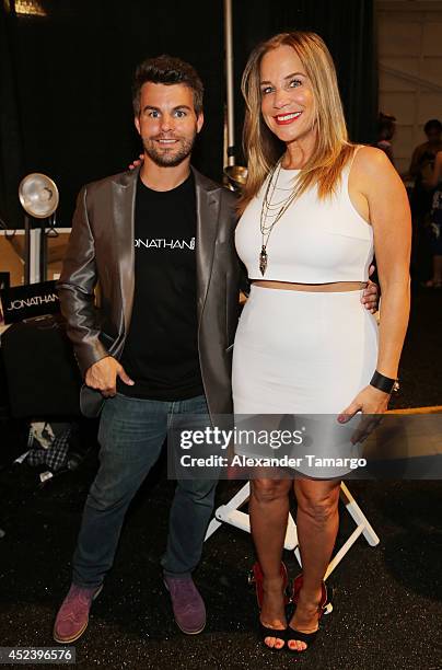 Stylist Jonathan Powell and designer Monica Wise pose backstage at the L*Space By Monica Wise fashion show during Mercedes-Benz Fashion Week Swim...