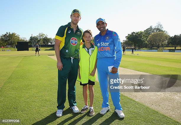 Cameron White of Australia A and Robin Uthappa of India A pose with the coin-toss winner during the Quadrangular One Day Series match between...