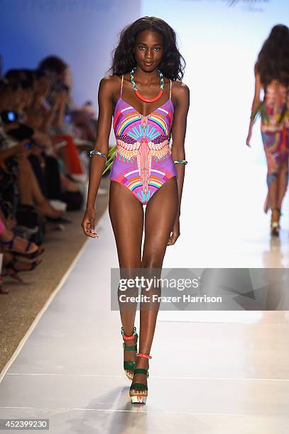 Model walks the runway at the Mara Hoffman Swim fashion show during Mercedes-Benz Fashion Week Swim 2015 at Cabana Grande at The Raleigh on July 19,...