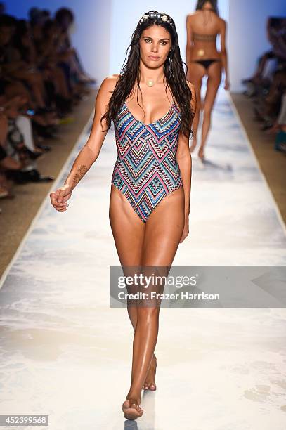 Model walks the runway at the L*Space By Monica Wise fashion show during Mercedes-Benz Fashion Week Swim 2015 at The Raleigh at Raleigh Hotel on July...