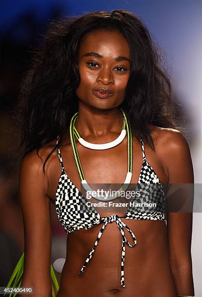 Model walks the runway at the Mara Hoffman Swim fashion show during Mercedes-Benz Fashion Week Swim 2015 at Cabana Grande at The Raleigh on July 19,...