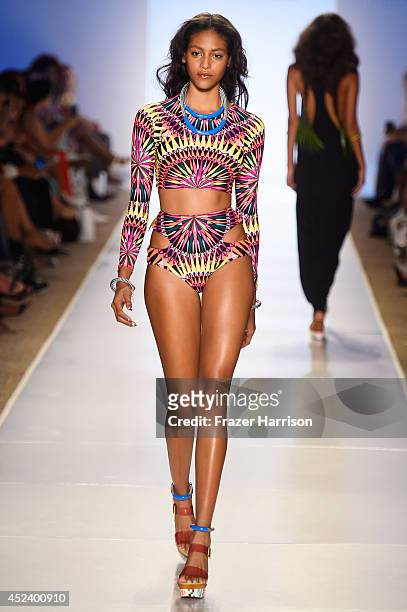 Model walks the runway at the Mara Hoffman Swim fashion show during Mercedes-Benz Fashion Week Swim 2015 at The Raleigh at Raleigh Hotel on July 19,...