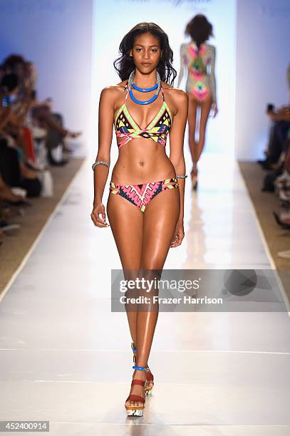 Model walks the runway at the Mara Hoffman Swim fashion show during Mercedes-Benz Fashion Week Swim 2015 at The Raleigh at Raleigh Hotel on July 19,...