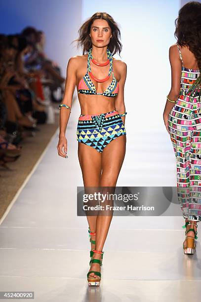 Model walks the runway at the Mara Hoffman Swim fashion show during Mercedes-Benz Fashion Week Swim 2015 at The Raleigh at Raleigh Hotel on July 19,...