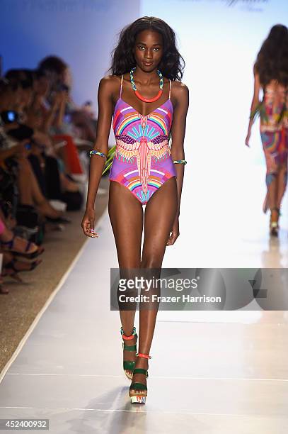 Model walks the runway at the Mara Hoffman Swim fashion show during Mercedes-Benz Fashion Week Swim 2015 at The Raleigh at Raleigh Hotel on July 19,...