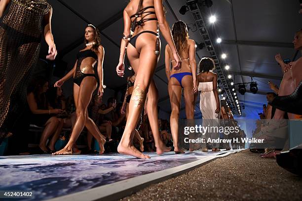 Models walk the runway at the L*Space By Monica Wise fashion show during Mercedes-Benz Fashion Week Swim 2015 at The Raleigh on July 19, 2014 in...