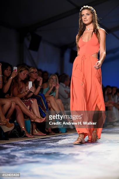 Model walks the runway at the L*Space By Monica Wise fashion show during Mercedes-Benz Fashion Week Swim 2015 at The Raleigh on July 19, 2014 in...