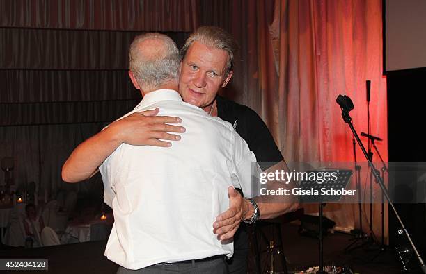 Johnny Logan sings with Franz Beckenbauer at the Kaiser Cup 2014 Gala on July 19, 2014 in Bad Griesbach near Passau, Germany.