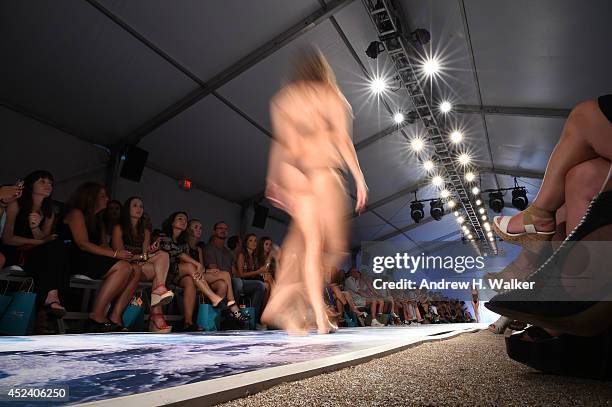 Model walks the runway at the L*Space By Monica Wise show during Mercedes-Benz Fashion Week Swim 2015 at The Raleigh on July 19, 2014 in Miami Beach,...