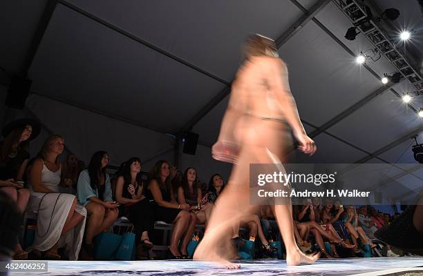 Model walks the runway at the L*Space By Monica Wise show during Mercedes-Benz Fashion Week Swim 2015 at The Raleigh on July 19, 2014 in Miami Beach,...