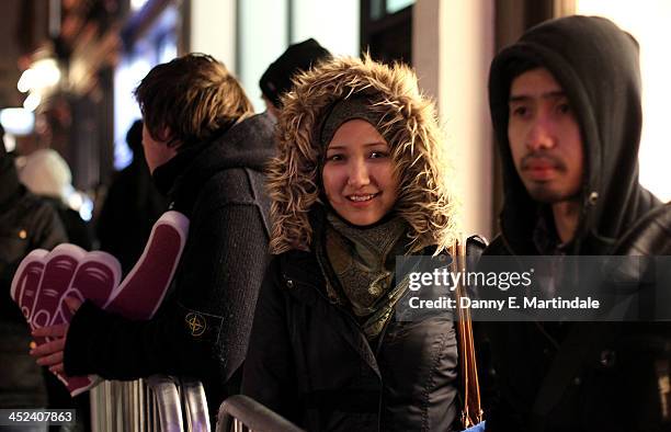 Female gamer waits patiently in the queue outside the PS4 lounge in Covent Garden ahead of the launch of the Playstation 4 on November 28, 2013 in...