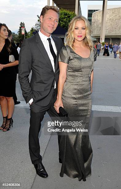 Musician Martyn LeNoble and actress Christina Applegate attend Dizzy Feet Foundation's Celebration Of Dance Gala at The Music Center on July 19, 2014...
