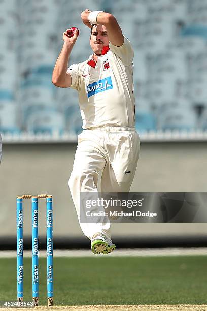 Chadd Sayers of the Redbacks bowls during day one of the Sheffield Shield match between the Victoria Bushrangers and the South Australia Redbacks at...