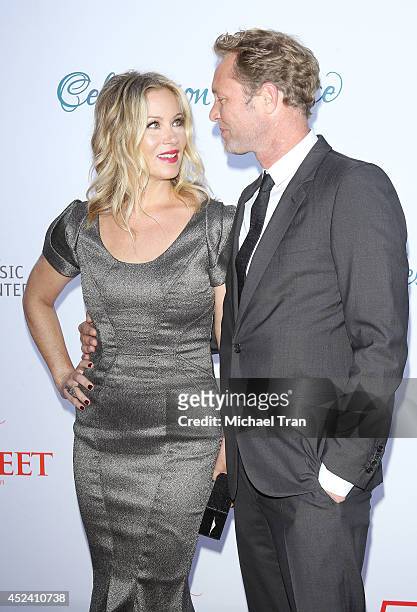 Christina Applegate and Martyn LeNoble arrive at The Dizzy Feet Foundation's 4th Annual Celebration of Dance Gala held at Dorothy Chandler Pavilion...