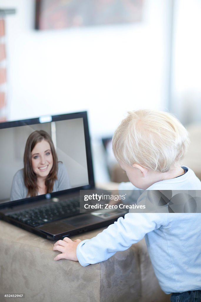 Baby boy distracted on video call to mother