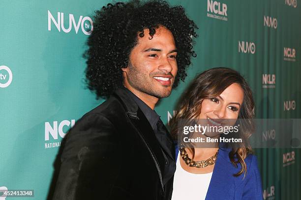 Actor Manwell Reyes and comedian Anjelah Johnson attend the NUVOtv Comedy Night at Los Angeles Convention Center on July 19, 2014 in Los Angeles,...