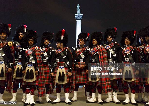 Members of the Shree Muktajeeven Swamibapa pipe band gather in Trafalgar Square to record a song on July 12, 2014 in London, England. The pipe band...