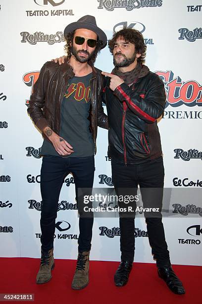 Spanish singers Leiva and Quique Gonzalez attend the Rolling Stone Magazine Awards 2013 at the Kapital Club on November 28, 2013 in Madrid, Spain.