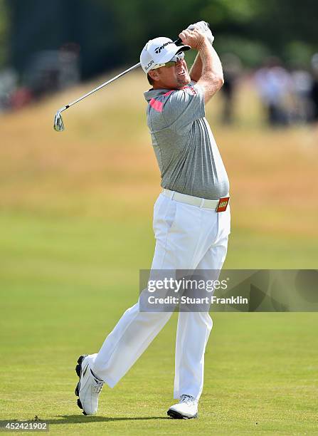 Points of the United States hits an approach shot during the final round of The 143rd Open Championship at Royal Liverpool on July 20, 2014 in...