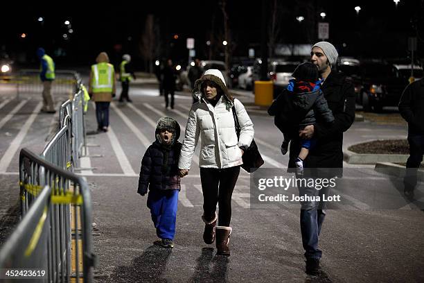 Customers arrive at Wal-Mart Thanksgiving day on November 28, 2013 in Troy, Michigan. Black Friday shopping began early this year with most major...