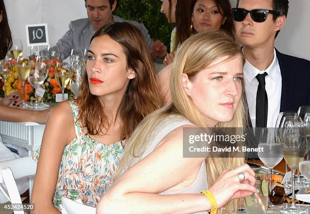 Alexa Chung and Gillian Orr attends the Veuve Clicquot Gold Cup Final at Cowdray Park Polo Club on July 20, 2014 in Midhurst, England.