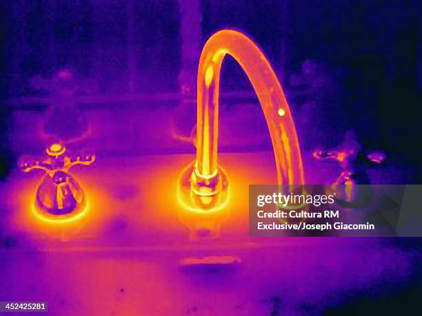 sink showing the thermal effect of the hot and cold water - thermal image fotografías e imágenes de stock