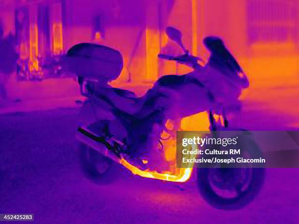 thermal photograph of motorcycle showing heat of engine, radiator and exhaust pipe - glow rm fotografías e imágenes de stock