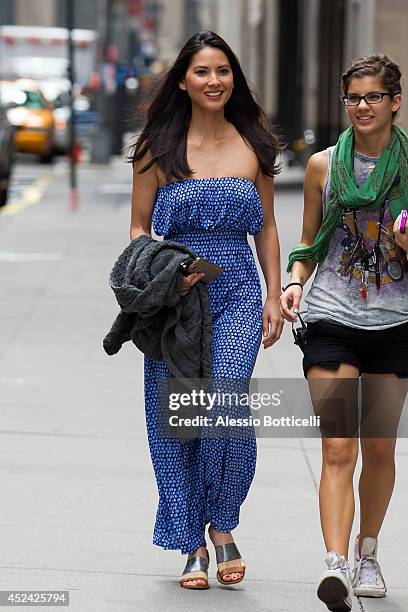 Olivia Munn is seen on location in Times Square for "The Newsroom" on July 19, 2014 in New York City.