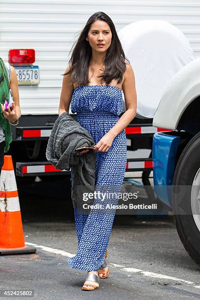 Olivia Munn is seen on location in Times Square for "The Newsroom" on July 19, 2014 in New York City.