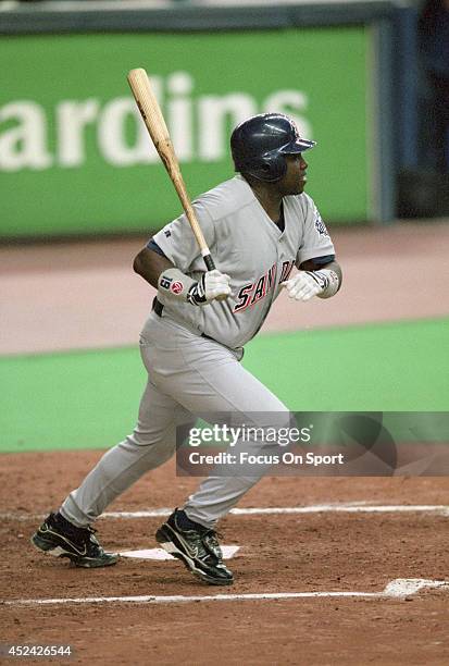 Tony Gwynn of the San Diego Padres hits a single against the Montreal Expos for the 3000th hit of his career during an Major League Baseball game...