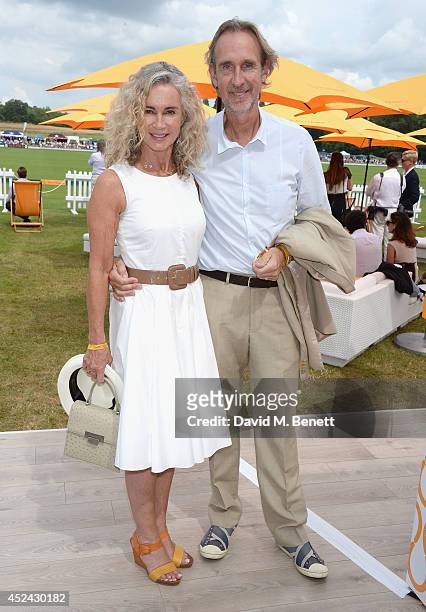 Angie Rutherford and Mike Rutherford attend the Veuve Clicquot Gold Cup Final at Cowdray Park Polo Club on July 20, 2014 in Midhurst, England.