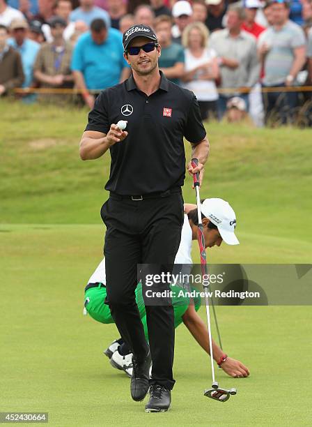 Adam Scott of Australia acknowledges the crowd on the 15th hole during the final round of The 143rd Open Championship at Royal Liverpool on July 20,...