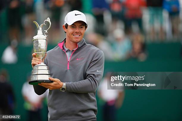 Rory McIlroy of Northern Ireland holds the Claret Jug after his two-stroke victory at The 143rd Open Championship at Royal Liverpool on July 20, 2014...