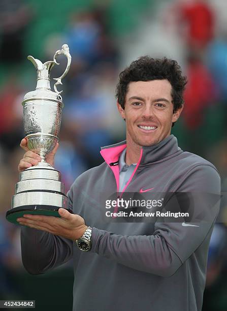 Rory McIlroy of Northern Ireland holds the Claret Jug after his two-stroke victory at The 143rd Open Championship at Royal Liverpool on July 20, 2014...