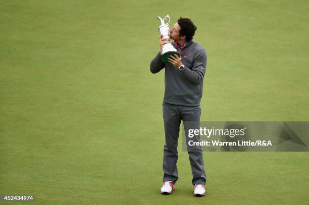 Rory McIlroy of Northern Ireland celebrates with the Claret Jug after his two-stroke victory after the final round of The 143rd Open Championship at...