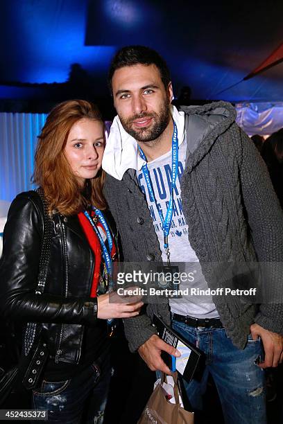 Paris-Saint-Germain Football Player Salvatore Sirigu and his companion attend the 'One Drop' Gala, held at Cirque du Soleil on November 28, 2013 in...