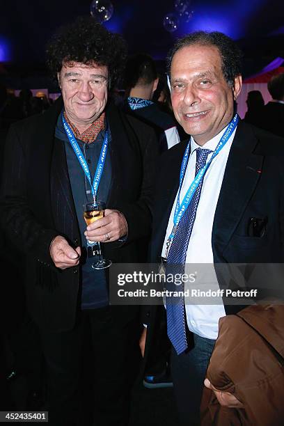 Singer Robert Charlebois and his Brother Thierry Dassault attend the 'One Drop' Gala, held at Cirque du Soleil on November 28, 2013 in Paris, France.